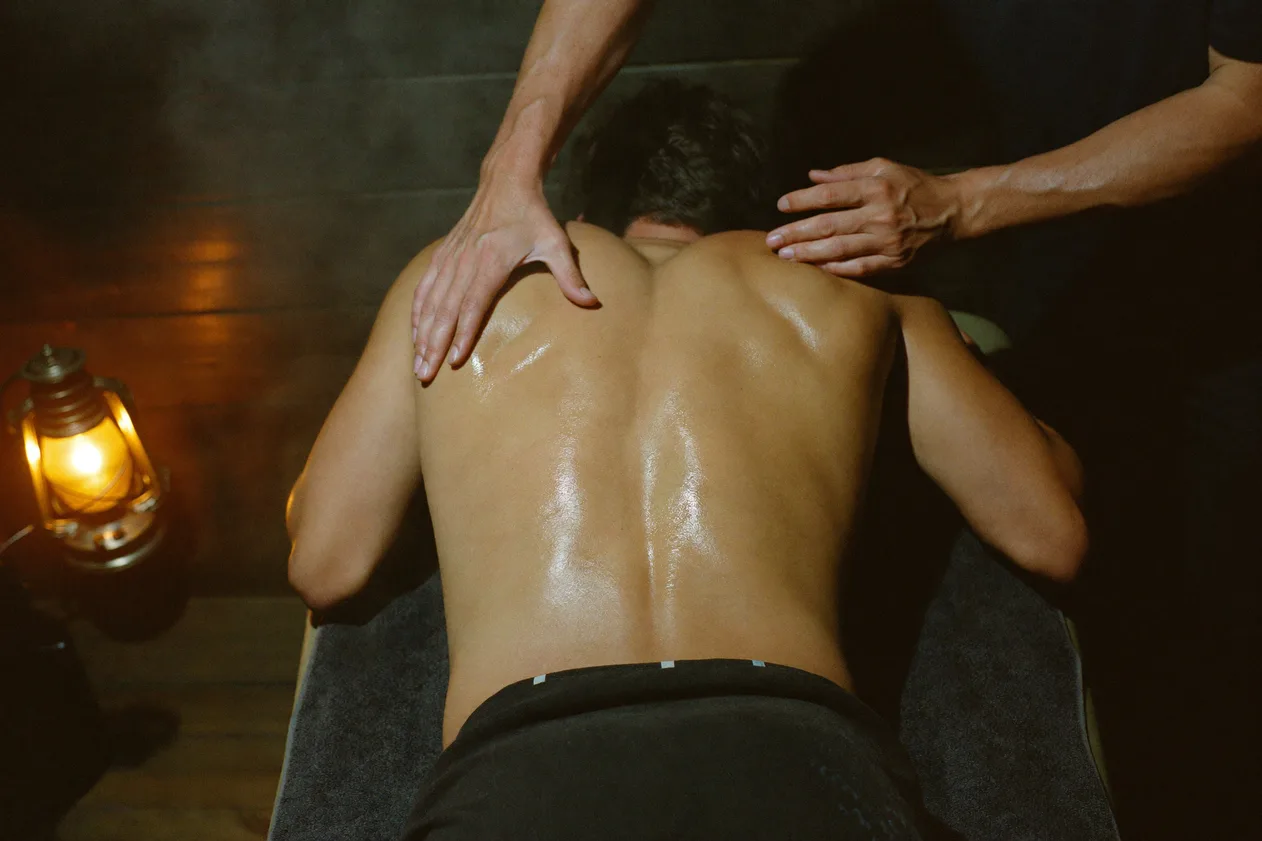 Man receiving a deep back massage